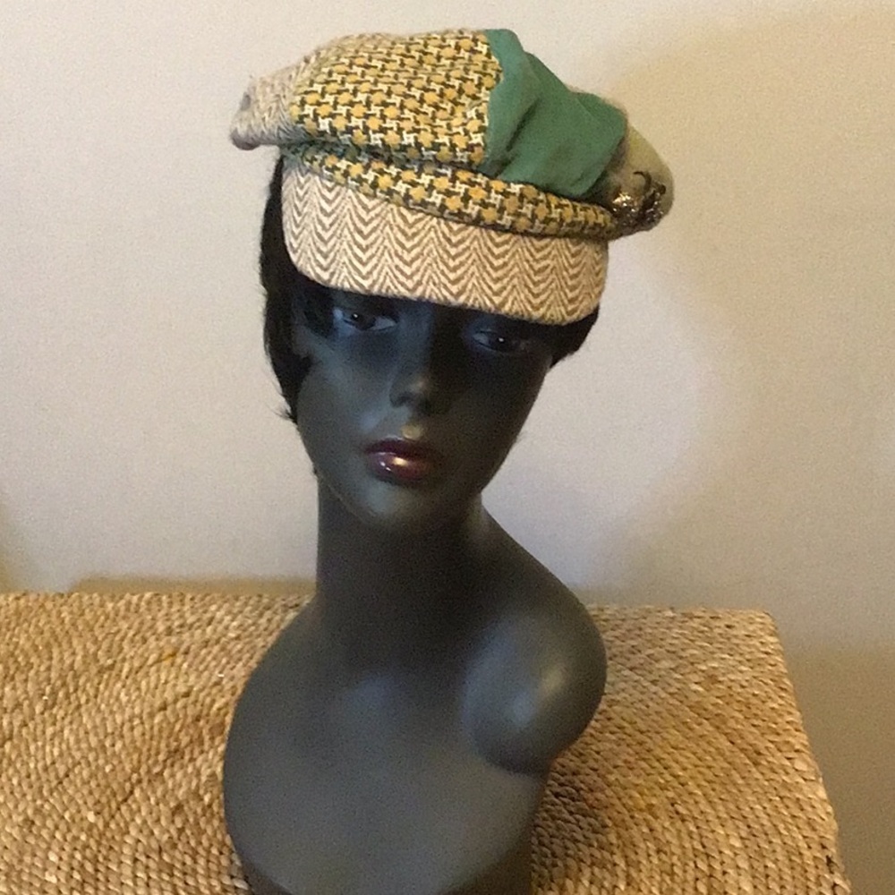 Funky fabric newsboy, cap, in beige, tan, yellow, and sage. Good used condition.